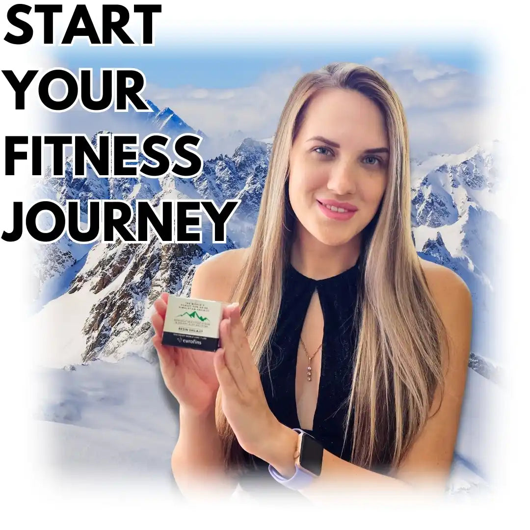 Smiling woman holding a Properdex Jar in front of snowy mountain background